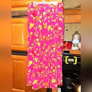 A Petite Sophisticate 100% Silk maxi skirt in a size 12. Pre-loved in great con.